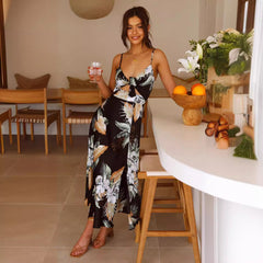 Vestido largo cruzado con roseta acampanada