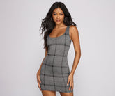 Juega con los minivestidos a cuadros sin mangas