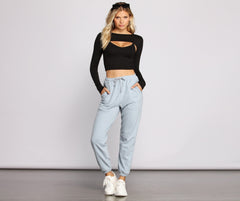 Top básico y elegante de manga larga