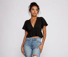 Blusa peplum plisada y elegante