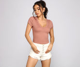 Top corto de punto acanalado imprescindible