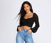 Bonita blusa plisada con lazo en la cintura