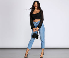 Bonita blusa plisada con lazo en la cintura