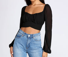 Bonita blusa plisada con lazo en la cintura