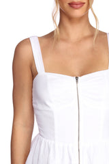 Top peplum con cremallera