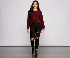 Suéter de chenilla desgastado y elegante