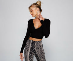 Top corto básico y elegante con detalle de botones