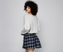 Top corto informal con cuello henley