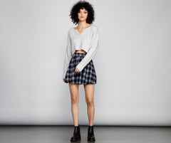 Top corto informal con cuello henley