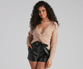 Suéter con giro brillante