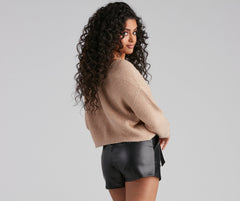 Suéter con giro brillante