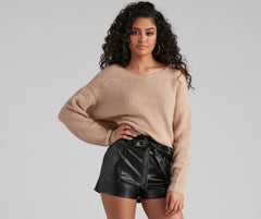 Suéter con giro brillante