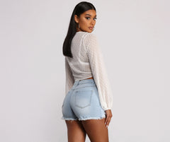 Top tejido con lunares y lazo en la parte delantera