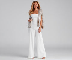 Capa de punto con lentejuelas para llamar al telón