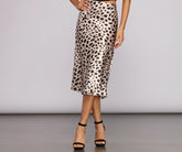 Faldas midi de satén con vuelo y estampado de leopardo