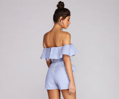 Mono con volantes y rayas