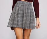 Minifaldas plisadas chic de pata de gallo