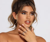 Juego de anillos de diamantes de imitación con forma de daga