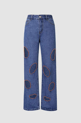 Jeans rectos con cortes quemados