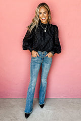 Top negro con mangas llamativas y lazo en la espalda No Secrets