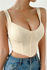 Top corto tipo corsé con tirantes tipo corpiño y escote en forma de corazón