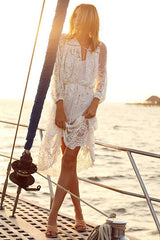 Vestido midi con cintura anudada y bordado de encaje