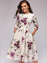 Vestidos skater de corte A con cuello redondo y mangas tres cuartos