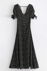 Vestido largo con lazo en la espalda y lunares galácticos