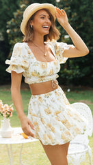 Conjuntos de top y falda cortos con estampado floral amarillo