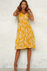 Vestido midi con estampado de hojas y botones