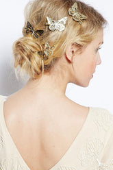 Adorno para el pelo de mariposa metálica