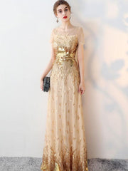 Vestidos tubo de manga corta con cuello redondo y lentejuelas estampadas en contraste