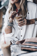 Echa un vistazo al minivestido camisero con botones