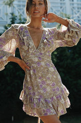 Außergewöhnlich schickes rückenfreies Minikleid mit Blumendruck