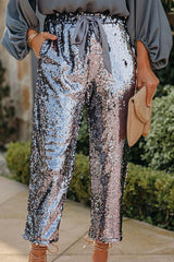 Urlaubsfertige Hose mit goldener Paillettenschleife