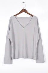 Top de punto de manga larga con cuello en V de Basics Bevin
