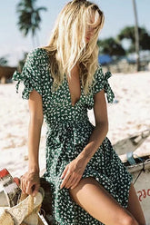 Vestido midi cruzado con mangas anudadas y efecto tembloroso