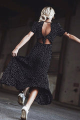 Vestido largo con lazo en la espalda y lunares galácticos