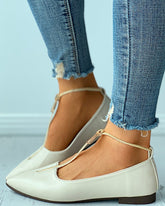 Zapatos casuales con punta puntiaguda y diseño de cremallera