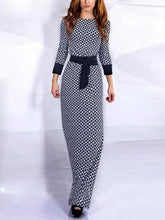 Bonito vestido largo de manga larga hasta el suelo