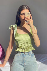 Top corto con corsé y lazo verde Perfectly Pleased