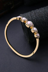 Pulsera elegante de perla metálica