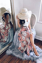 Pantalones de abertura alta con estampado de rosas