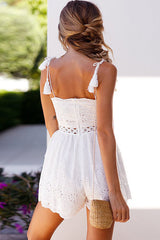 Mono de encaje con borlas y espaguetis