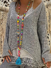 Suéter de punto irregular de manga larga con cuello en V y guantes de talla grande