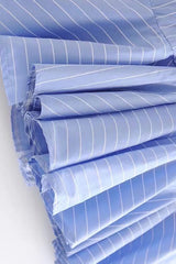 Mono de paseo con volantes y rayas azules