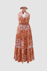 Vestido largo con cuello halter, espalda anudada y estampado floral