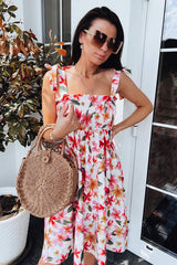 Date un capricho con este minivestido con lazo y estampado floral