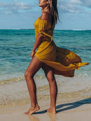 Vestidos de vacaciones largos de gasa con hombros descubiertos y mangas anudadas