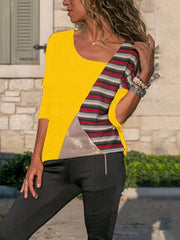 Lässiges T-Shirt mit Patchwork-Streifen in passender Farbe und rundem Kragen und langen Ärmeln